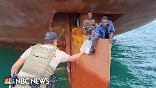 Watch 4 stowaways rescued from ships rudder after crossing the Atlantic [upl. by Chien]