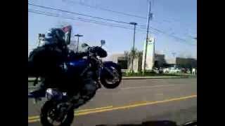 Ninja 650R Power Wheelie down a busy street [upl. by Unhsiv139]