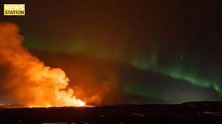 Iceland Northern Lights captured glowing over erupting volcano [upl. by Olette29]