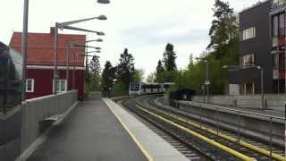 Oslo Tbane line 1 train from Frognerseteren to Helsfyr arriving at Holmenkollen station [upl. by Ybocaj]