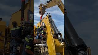 Detaching the hydraulic cylinders from the 6015B boom heavyequipment constructionequipment [upl. by Hsirk764]