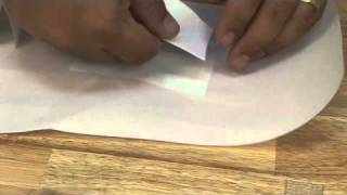 Using Dacron Sail Repair Tape or Insignia Adhesive Material for Sail Repair [upl. by Andree]