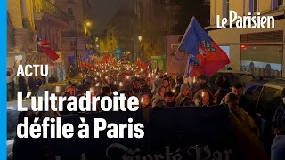 500 identitaires défilent aux flambeaux à Paris [upl. by Ymma]