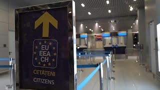 Travellers arrive at Bucharest airport as passport and visa checks for Schengen area passengers are [upl. by Nomaid705]