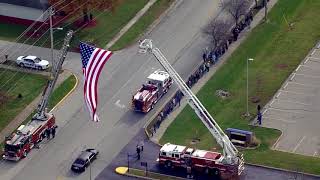 Procession for fallen Greenfield firefighter travels under Garrison [upl. by Nahte]