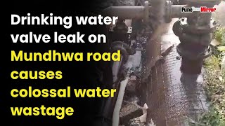 Drinking water valve leak on Mundhwa road causes colossal water [upl. by Ahsitra]