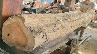 sawing inland teak logs into chunks of fullgrained wooden frames at the sawmill [upl. by Beuthel]