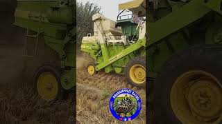 Tractor combine harvester on John Deere 5210 [upl. by Henrie]