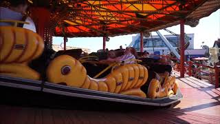 People Enjoying A Caterpillar Ride amusement carnival fairground family fast fun funfair hol [upl. by Gonzales]