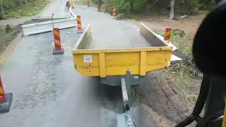 Wheel excavator with trailer working at road [upl. by Ripley199]