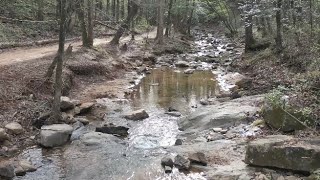 Drone footage gemstone mining stream Hiddenite NC Emerald Hollow mine [upl. by Evvy]