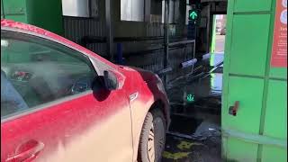 How Leisuwash 360 model touchless car wash machine cleaning a dirty car in Russia Red one [upl. by Yelrak]