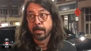 Dave Grohl Argues With Autograph Hounds After Refusing To Sign Their Stuff [upl. by Ellenrahs655]