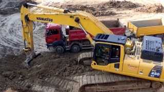 Komatsu PC 450LC and Man tipper [upl. by Ymmor819]