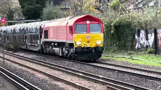 66106 leads 6X11 the daily Toton yard to Dollands Moor Toyota car train through Kensington Olympia [upl. by Rother]