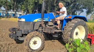 New Holland TT55 Tractor VideoNew Holland TT55 Tractor plowing the rotoragriculture video [upl. by Annoled]