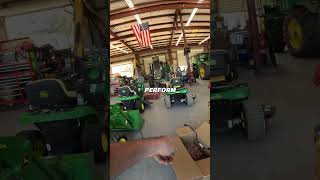 Installing a Backhoe on John Deere 1025R johndeere deere agriculture [upl. by Arahsit]