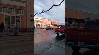 Fire department hanging Christmas decorations in front of a fire trap shelter [upl. by Lemmuela]