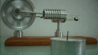 Stirlingmotor Heissluftmotor Stirling motor hot air engine running on a small candle [upl. by Ylenats]