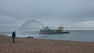 A dredger laying shingle on Southsea seafront to help with the sea defences [upl. by Schober]