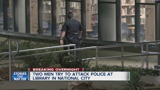 Suspect hurls extinguisher from library roof [upl. by Akiram639]