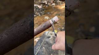 Make a saw out of a clothes hanger survival bushcraft outdoors camping [upl. by Ephrem38]