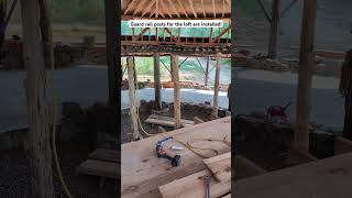 Guard rail posts for the loft are installed naturalbuilding cobhouse deck diy naturalhome [upl. by Eenolem]