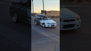 Nissan stagea wagon with r34 skyline gtr front end and mclaren 600lt pulling into car show [upl. by Osric]