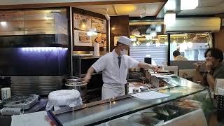 Sushi making at Tsukiji fish market Tokyo Japan [upl. by Yerrot346]