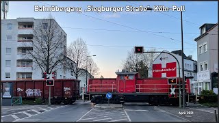 Bahnübergang quotSiegburger Straßequot Köln  Gleiskreuzung mit StraBa  V90 in den Deutzer Hafen [upl. by Inohtna]