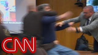 Father lunges at Larry Nassar in court [upl. by Kcirret]