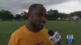 Captain Munnerlyn holds youth football camp [upl. by Icnarf547]