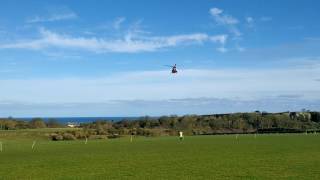 Coastguard Helicopter 999 at Craster Northumberland [upl. by Westbrooke]