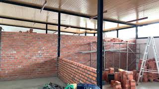 Single brick wall and column stiffener installation [upl. by Nosac943]