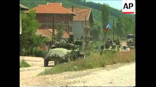 KOSOVO YUGOSLAV ARMY MOVING OUT OF PROVINCE [upl. by Dalenna6]