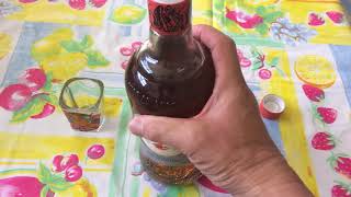 How to open a bottle of Angostura 7 Rum Liquor [upl. by Kcirderfla]