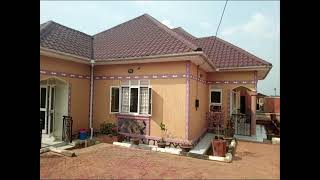 250m located at matugga kavule 1 kilometer from tarmac 100100ft title 4 bedrooms dinning bathroom [upl. by Digdirb790]