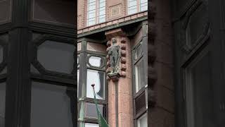 Sculptures on the facade of Wuorio House Helsinki Finland [upl. by Seerdi803]