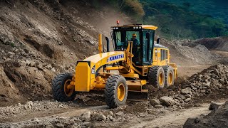 The pile of rocks on the construction site with heavy motor grader machinery operating on the road [upl. by Eirrek260]