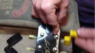 Master Luthiers Guitar String Winding Technique [upl. by Assilrac]