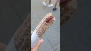 Boysenberry fruit stuffed cinammon covered fresh churro  Knotts Berry Farm California 9142024 [upl. by Imnubulo]