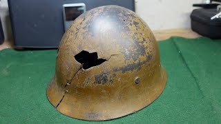 Straight From Okinawa A Battle Damaged Japanese Type 90 Helmet Bringback From The South Pacific [upl. by Aicatsana]