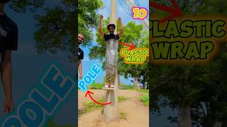 How Many Plastic Wrap Layers to Stick ME On A Pole  shorts experiment [upl. by Odrareve566]