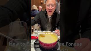 How to Eat Swiss Cheese Fondue at Engiadina Restaurant St Moritz [upl. by Gerianne]