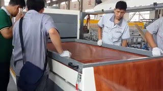 wpc door panel laminating machinelaminate film on door panel surface [upl. by Teevens]