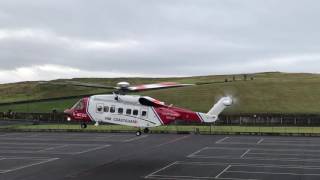 HM Coastguard landing helicopter in Portrush Ramore Head Northern Ireland [upl. by Amethyst395]