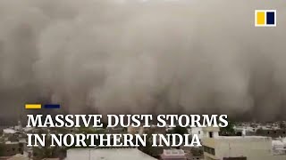 Massive dust storm sweeps through northern Indian state of Rajasthan [upl. by Hpesoy]