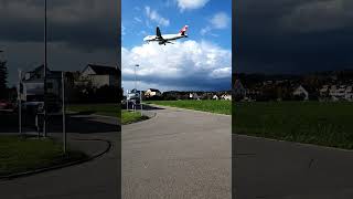 Slow motion aircraft above houses in Kloten near ZRH [upl. by Pierce]