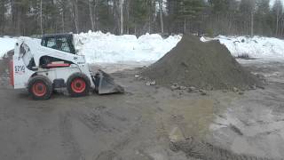 Bobcat S250 Pushing Up Pile [upl. by Doris276]