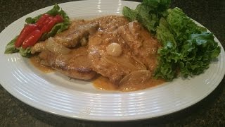 OVEN BAKED SMOTHERED PORK CHOPS [upl. by Attenat]